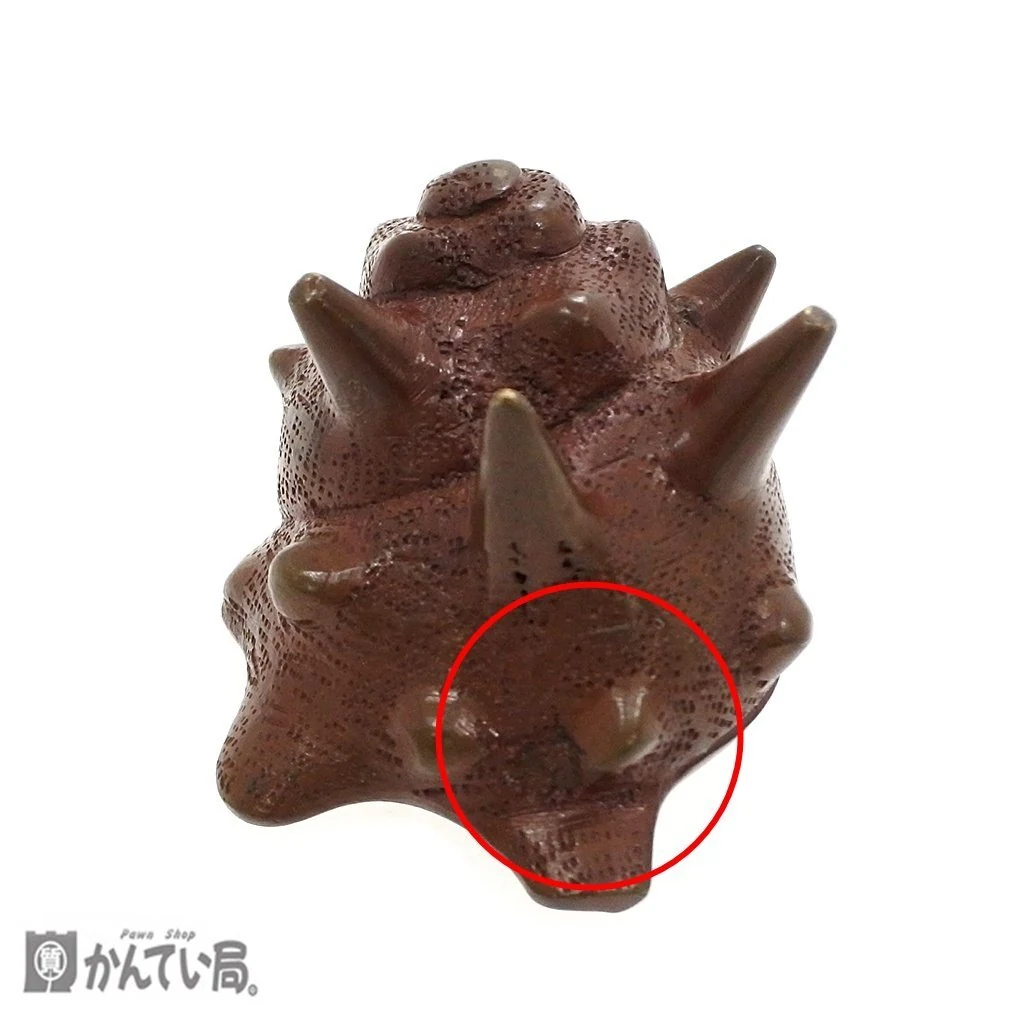 卖家标出红圈的尖端缺损位置