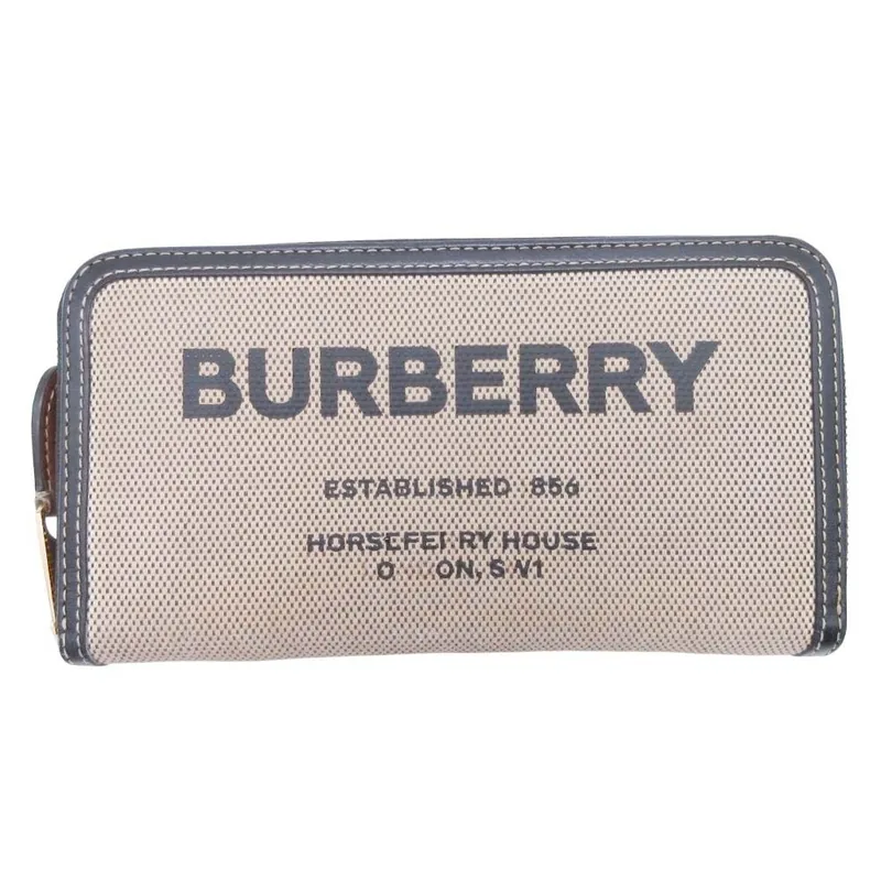 BURBERRY 马术骑士标长款拉链钱包外观,米色帆布配黑色,正面带有品牌标识
